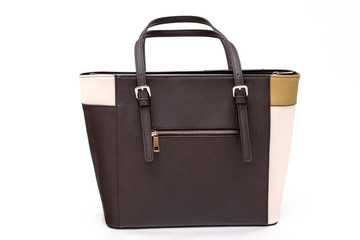 Luxury fashion women leather brown handbag isolated on a white background.