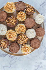Brigadeiro is a common Brazilian dessert. Delicious chocolate candy Brigadeiro on a table