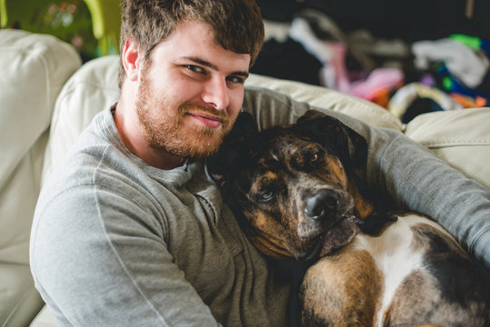 A man with a silly silly dog