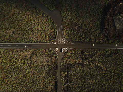 Aerial view of road intersection in terrain