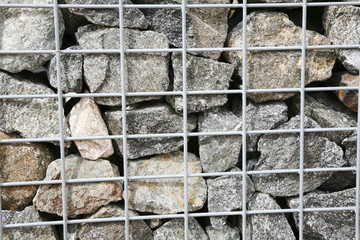 a wall stacked with stones
