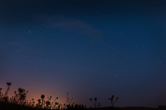 night landscape with a colorful sky