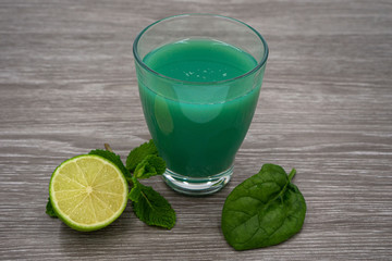 green smoothie with lime, spinach and mint