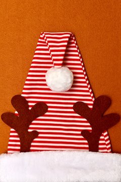 New Year striped cap with sump and deer horns.