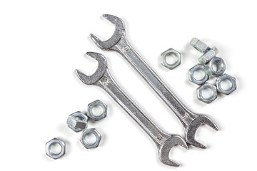 spanners and nuts on a white background