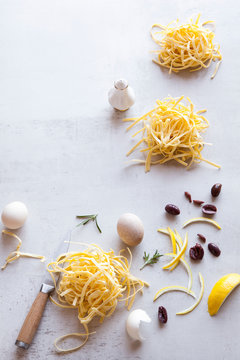 Preparing a pasta dish with homemade fettuccini pasta