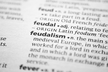 Fototapeta premium Word or phrase Feudalism in a dictionary.