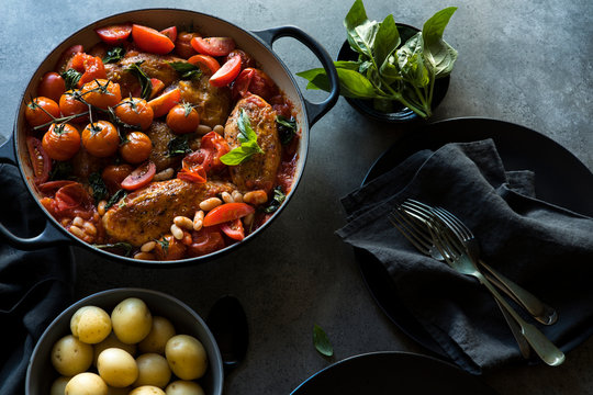 Crisp chicken with sweet tomatoes, white bean and basil