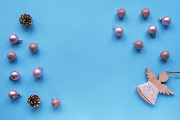 Blue festive background, Chrictmas toys with copy space, top view, flat lay