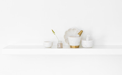 Kitchen wall shelf with white marble crockery
