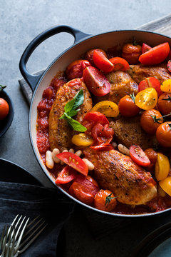 Crisp chicken with sweet tomatoes, white bean and basil