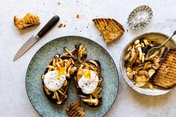Sunday brunch poached eggs with mushrooms and toast