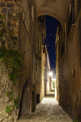 Caiazzo, Italy, 11/12/2019. A narrow street among the old houses of a medieval village