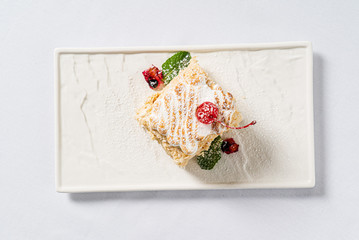 Christmas cake with cherry and cream