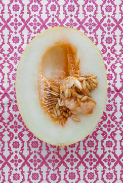 Sweet melon on pink pattern background