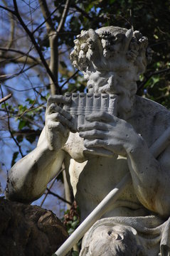 Pan statue in garden