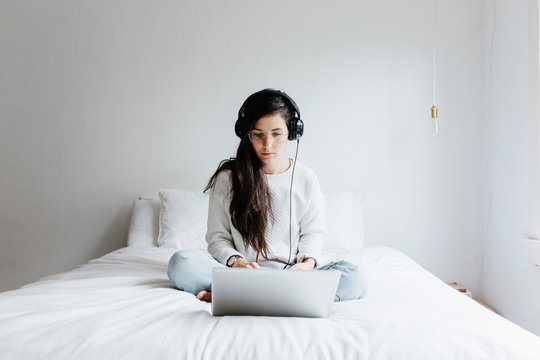 girl working in bedroom