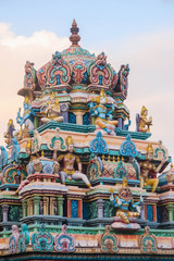 Fototapeta na wymiar Gopuram Of Hindu God Idols On Top Of Mamoothiamman Temple OMR Chennai Tamil Nadu South India