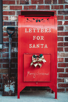 Letter box for Santa. Red box for letters to Santa Claus. Santa Claus letterbox close up.