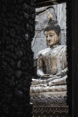 Closeup Shot at Budha Statue in A Burned / Burnt Temple from Electricity Short Circuit Accident or...