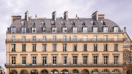 Fototapeta na wymiar Paris, typical building, parisian facade and windows rue de Rivoli 