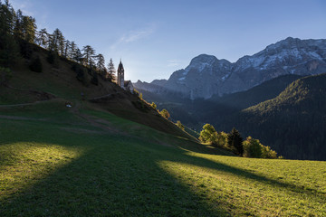 Valley in the Italian Dolomites, South Tyrol region. A view of the beautiful La Valle with its beautiful church.