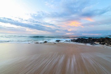 Fototapeta na wymiar Sunrise and wave lines Poipu Kauai