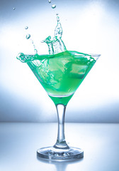 one of the most famous cocktails in the world, Lemon/Lime Daiquiri poured into a glass with ice