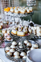 Delicious wedding reception candy bar dessert table