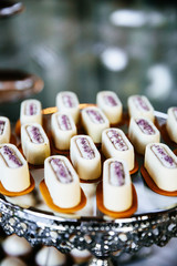 Delicious wedding reception candy bar dessert table