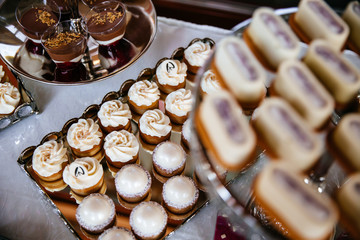 Delicious wedding reception candy bar dessert table