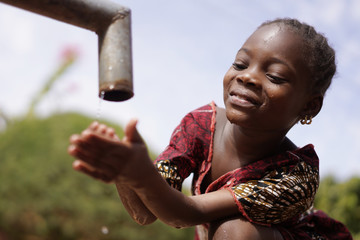 Close Up of African Black Ethnicity Girl Beautiful Drinking Water for Health - obrazy, fototapety, plakaty