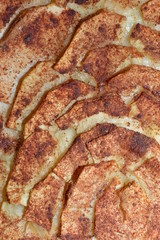 the background of the top part of the cake with apples Apple pie is ready