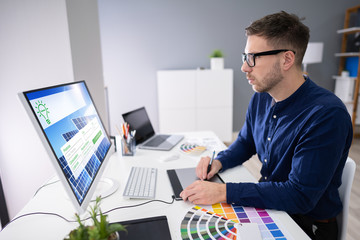 Male Designer Working On Computer