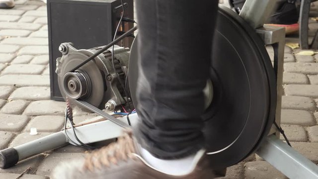 Dynamo Electric Machine. Pedal powered electricity generator on bicycle