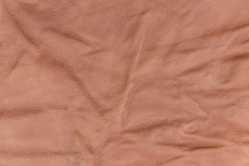 A piece of brown died wrinkled leather for background
