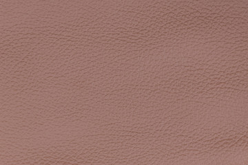 A piece of light brown died textured wrinkled leather for background horizontal