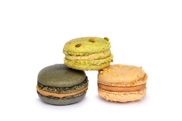 Colorful macaroons on white background
