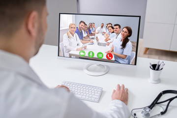 Doctor Video Conferencing On Laptop