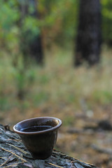 Tea ceremony. Teapot and bowls with Chinese tea on a wooden table. Drink, traditional, japan, health, beads, buddha, asia, asian, background, bamboo, beverage