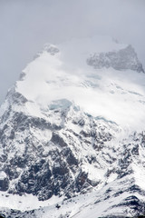 Fototapeta na wymiar Cloudy day at the mountain summit in El Chalten, Patagonia, Argentina