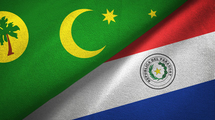Cocos Keeling Islands and Paraguay two flags textile cloth, fabric texture