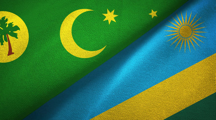 Cocos Keeling Islands and Rwanda two flags textile cloth, fabric texture