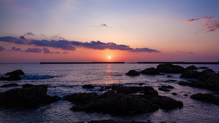 Fototapeta na wymiar 鹿児島県・屋久島町 水平線から昇る朝日の風景