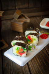 Colorful traditional japanese sushi rolls, vertical image