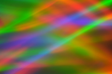 Obraz premium Colorful defocused light traces as abstract background with copy space