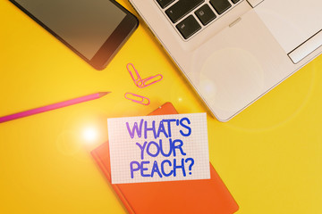 Conceptual hand writing showing What S Is Your Peach question. Concept meaning an exceptionally good demonstrating or thing Laptop smartphone clip pencil paper sheet colored background