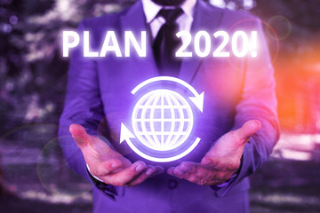 Conceptual hand writing showing Plan 2020. Concept meaning detailed proposal doing achieving...