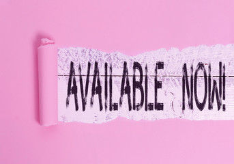 Handwriting text Available Now. Conceptual photo you can find it obtain or operable at this current moment Cardboard which is torn in the middle placed above a wooden classic table