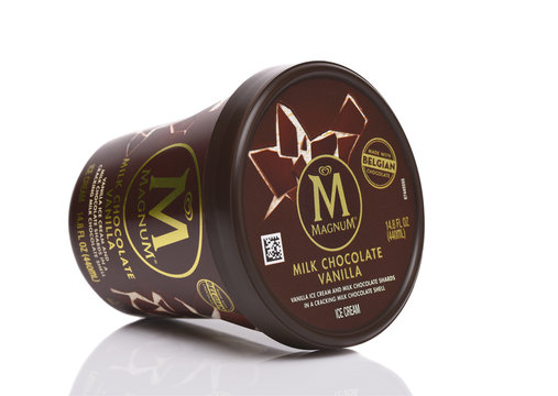 IRVINE, CALIFORNIA - 13 DECEMBER 2019: A container of Magnum Milk Chocolate Vanilla ice cream on its side.